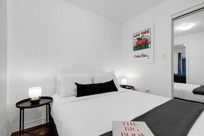 1 bedroom, desk, iron/ironing board, travel crib