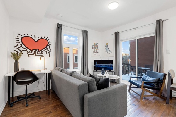 Living Room: Features 1 sofa bed, memory foam, and a Smart HD TV with Netflix, YouTube, and Prime.