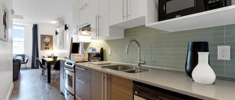 Coffee/tea maker, fridge, microwave, oven