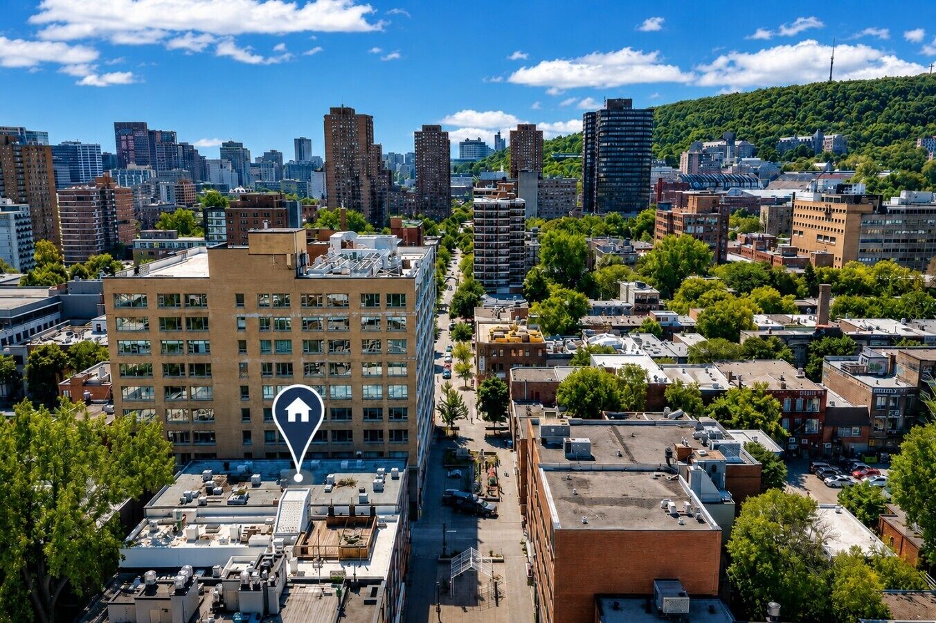 A cityscape with a prominent building featuring a rooftop terrace, surrounded by other buildings and greenery.