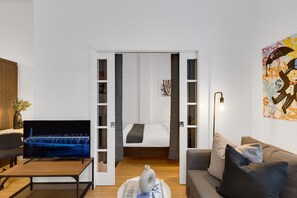 1 bedroom, desk, iron/ironing board, travel crib