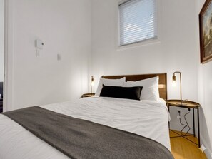2 bedrooms, desk, iron/ironing board, travel crib