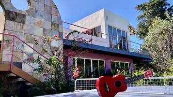 Deluxe Double Room, 1 Queen Bed, River View | Living area | Flat-screen TV