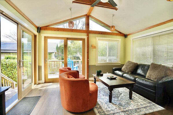 Flat-screen TV, DVD player, video library, stereo