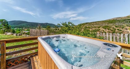 Redman! A single level, cozy cabin on a hill with a direct view of the Ruidoso Downs Racetrack!