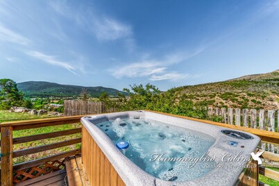 Redman! A single level, cozy cabin on a hill with a direct view of the Ruidoso Downs Racetrack!