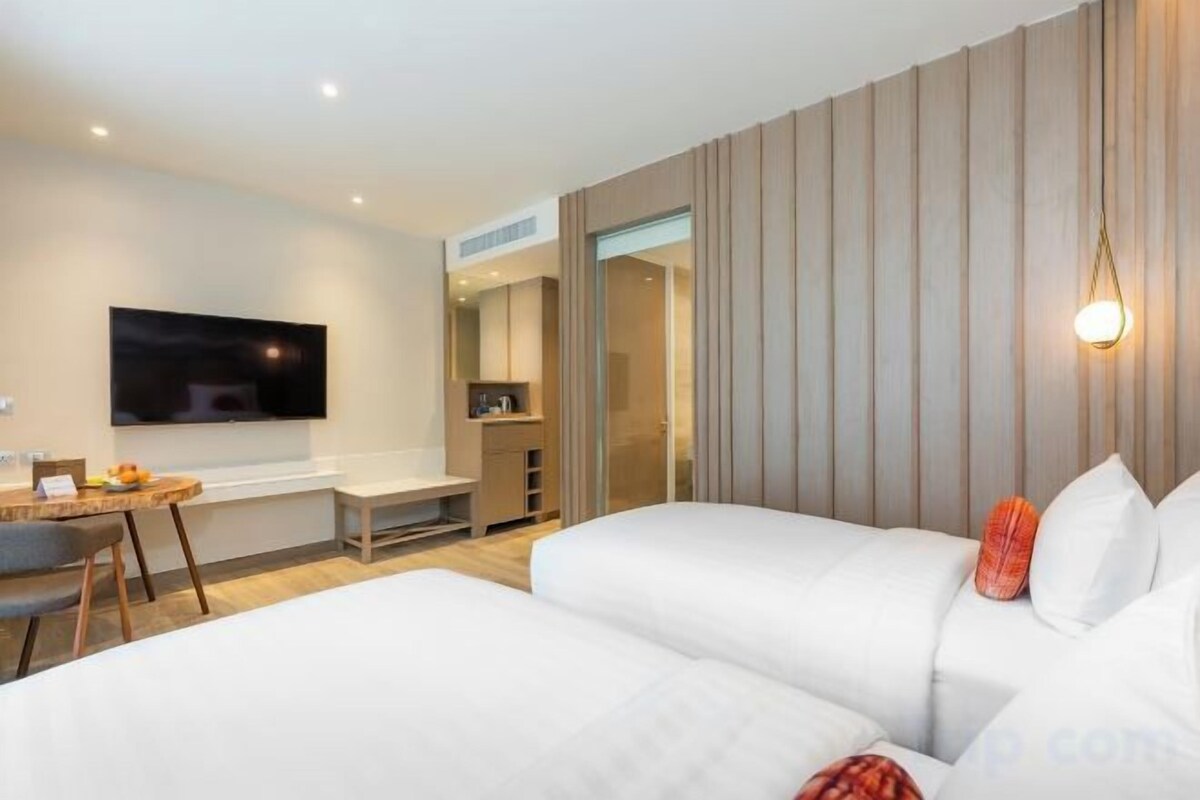 In-room safe, desk, blackout curtains, iron/ironing board (on request)