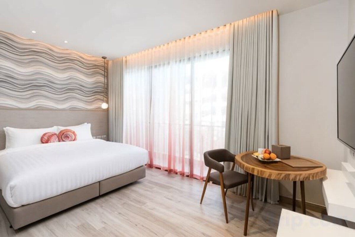 In-room safe, desk, blackout curtains, iron/ironing board (on request)
