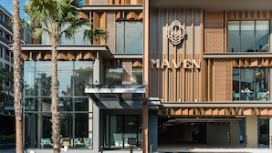 A modern building with the name "MAVEN" prominently displayed. - Maven Stylish Hotel Hua Hin (Hua Hin)