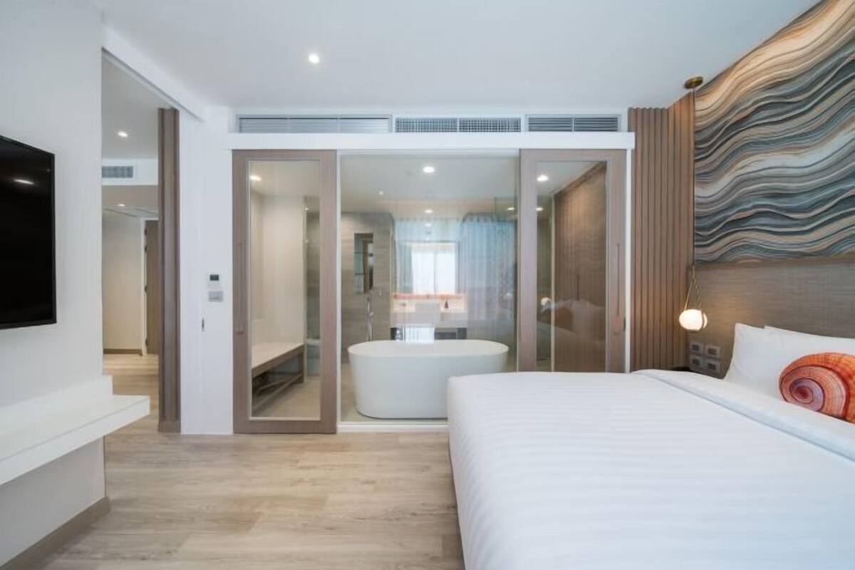 In-room safe, desk, blackout curtains, iron/ironing board (on request)