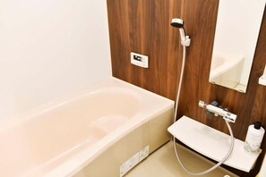 Private Vacation Home | Bathroom | Hair dryer, slippers, electronic bidet, towels