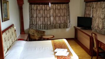 Desk, free WiFi, bed sheets