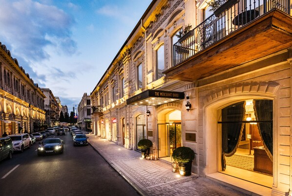 A street view of a building with a sign reading "The Merchant Baku". - The Merchant Baku (Baku)