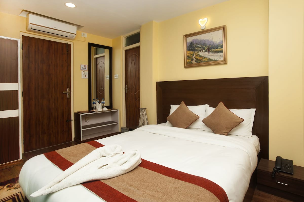 Chambre Double Deluxe | 1 chambre, Wi-Fi gratuit