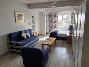Family Apartment, 1 Bedroom | Living area | 32-inch flat-screen TV with satellite channels, TV - Silver Sands Self Catering (Durban)