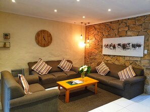 Basic Cottage | Living area | TV - Mountain View Cottages Self Catering (Drakensberg Gardens)