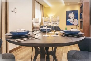 Deluxe Apartment, 3 Bedrooms | Living area | 32-inch flat-screen TV with satellite channels, TV - Appartement Meublé VIP Douala Bonapriso (Douala)