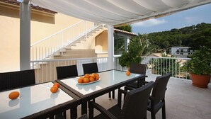 Outdoor dining - MEDINA. Modern villa just 325 m from crystal clear beaches (Cala San Vicente)