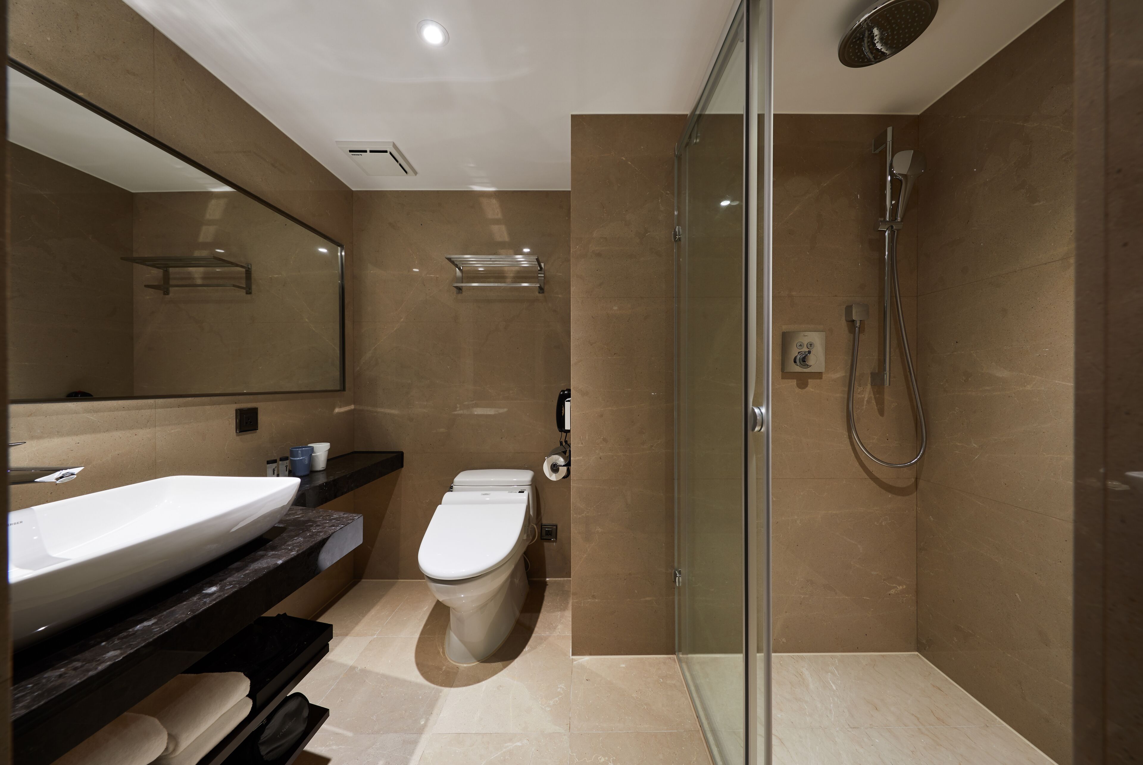 eco-friendly toiletries, hair dryer, slippers, bidet