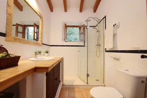 Bathtub, hair dryer, towels