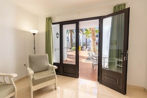 Apartment, 2 Bedrooms | Living room | Flat-screen TV - Apartamentos Flamingo (Tías)