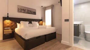 Suite familiar | Minibar y caja de seguridad en la habitación