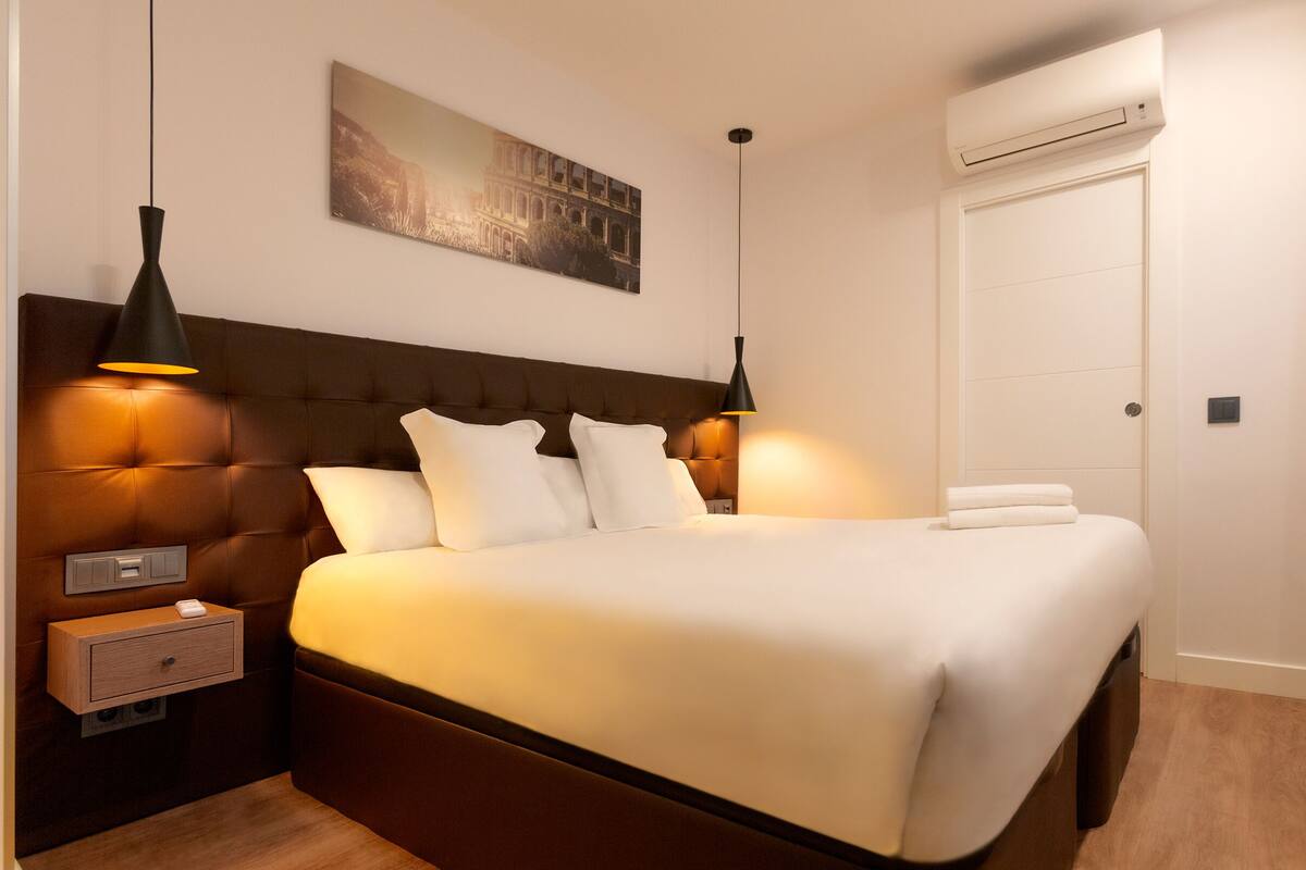 Phòng Suite Junior | Minibar, két bảo mật tại phòng, khu vực làm việc phù hợp cho laptop