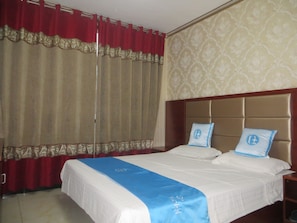 Desk, blackout curtains, free WiFi, bed sheets