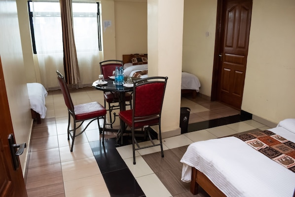 Desk, laptop workspace, free WiFi, bed sheets