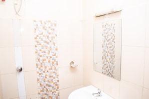 Shower, free toiletries, towels, soap