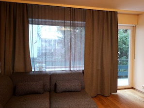 Appartement familial (incl. cleaning fee 40 EUR) | Salle de séjour | Téléviseur à écran plat