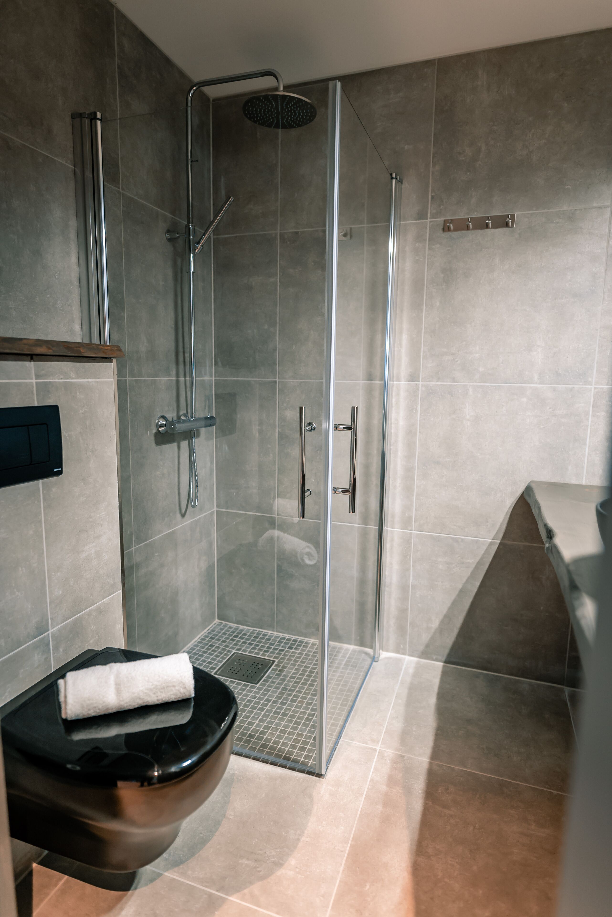 superior triple room | bathroom | shower, free toiletries, hair dryer, heated floors