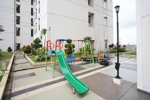 Children’s play area – outdoor - Margonda Residence 4&5 By Rent Room (Depok)