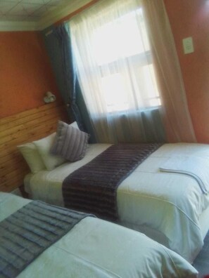 Economy Room, 1 Bedroom | Desk, free WiFi, bed sheets