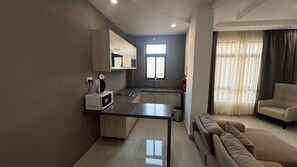 Apartment, 2 Bedrooms | Hypo-allergenic bedding, minibar, in-room safe, desk