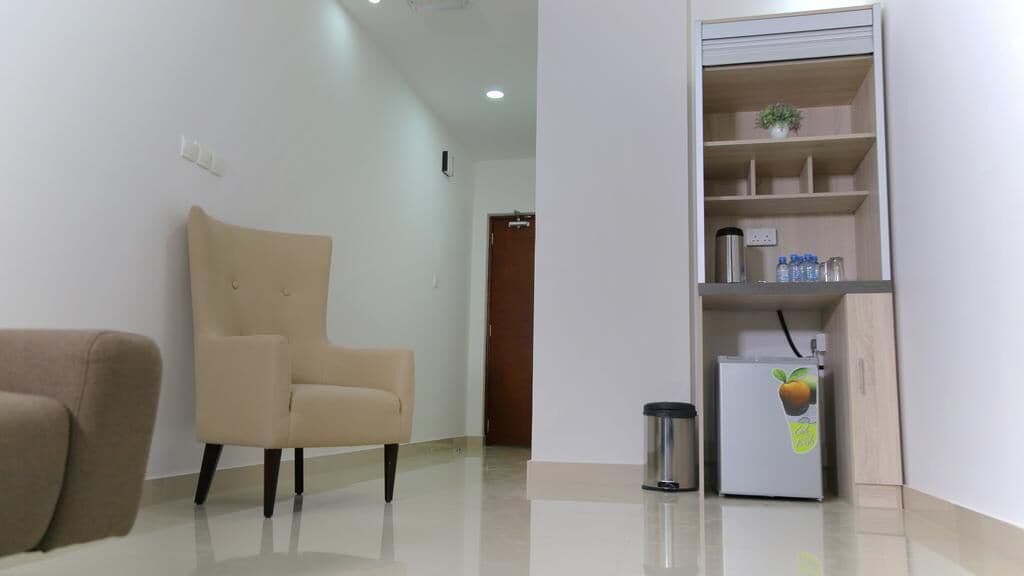 superior studio | living area | led tv