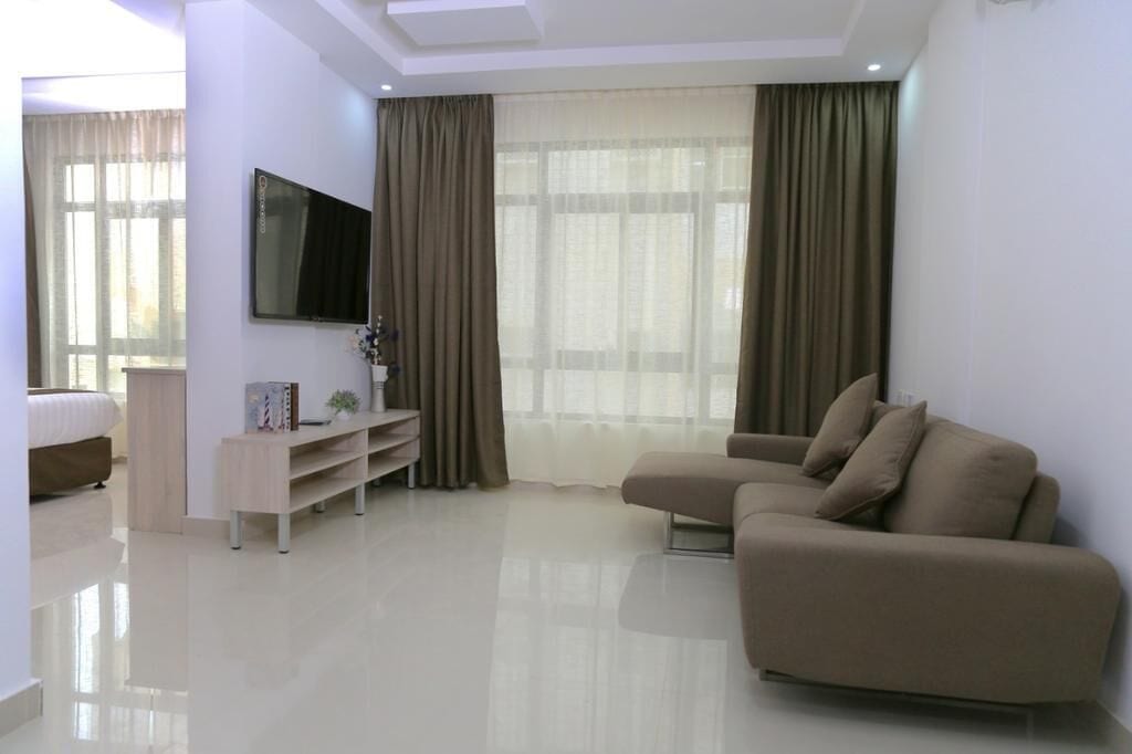 superior studio | living area | led tv