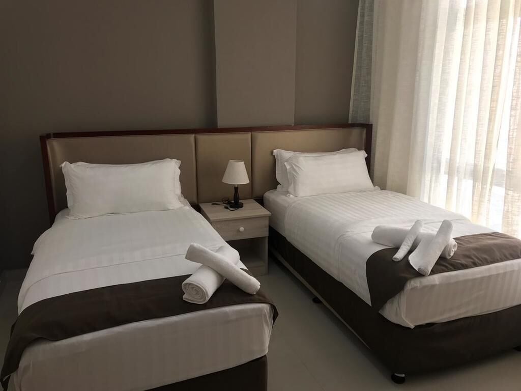 deluxe single room | 2 bedrooms, hypo-allergenic bedding, minibar, in-room safe