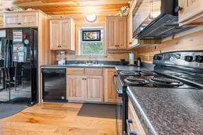 Private kitchen - Foxes' Den Cabin with Private Hot Tub and Arcade Game by RedAwning (Pigeon Forge)
