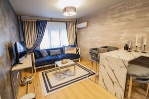 Suíte superior | Sala de estar | TV LCD