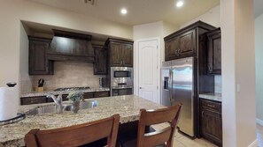 Townhome, 4 Bedrooms | Private kitchen | Fridge, oven, coffee/tea maker, toaster