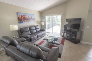 House, 4 Bedrooms | Living area | 30-inch TV with cable channels - Serene Private Pool In Southern Dunes! 4 Bedroom Home by RedAwning (Haines City)