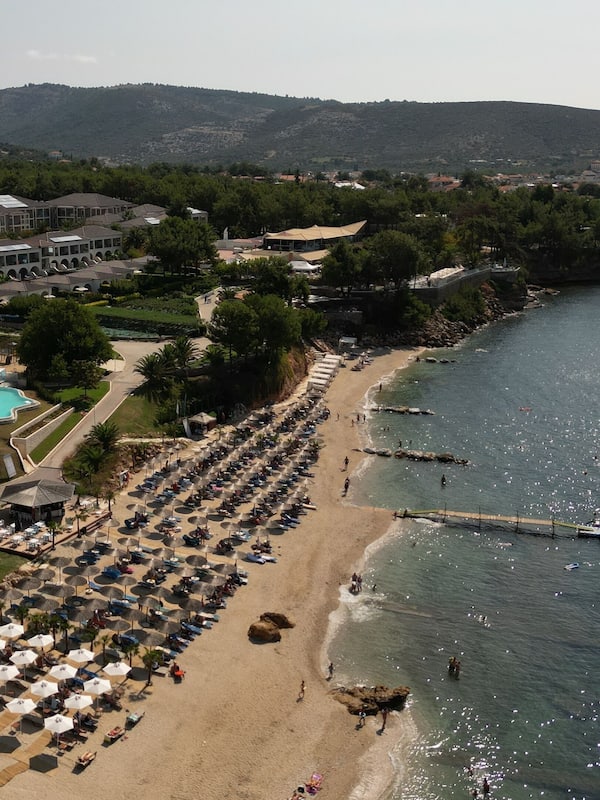 On the beach, sun loungers, beach umbrellas, beach towels