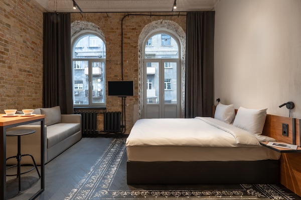 Urban Apartment | Blackout drapes, iron/ironing board, free WiFi, bed sheets