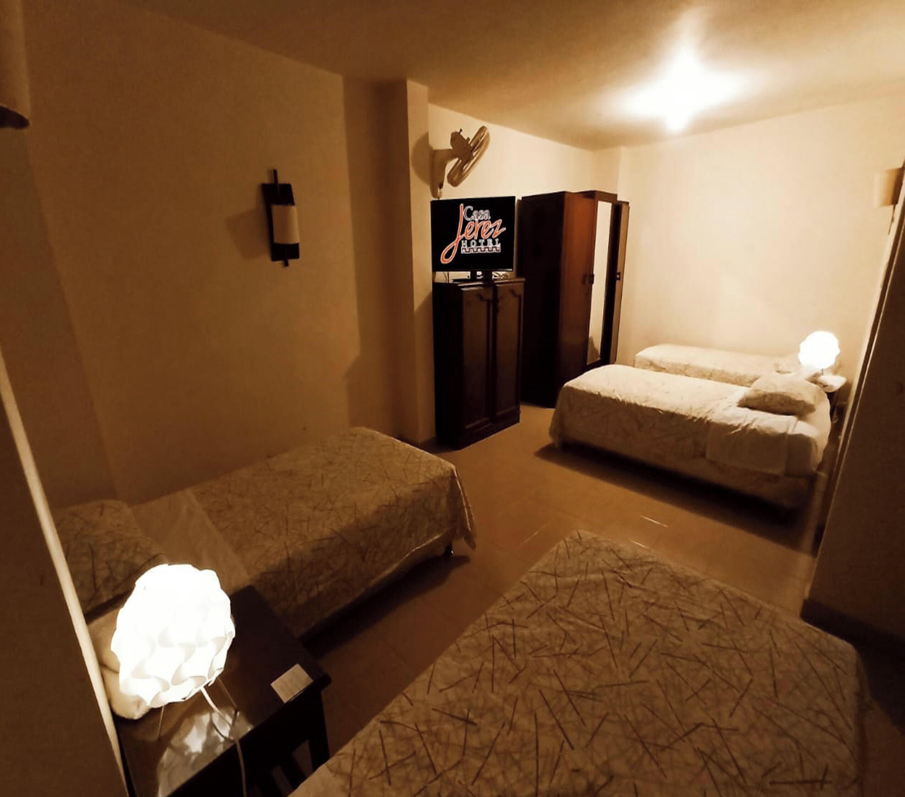 Basic Quadruple Room | Free WiFi, bed sheets