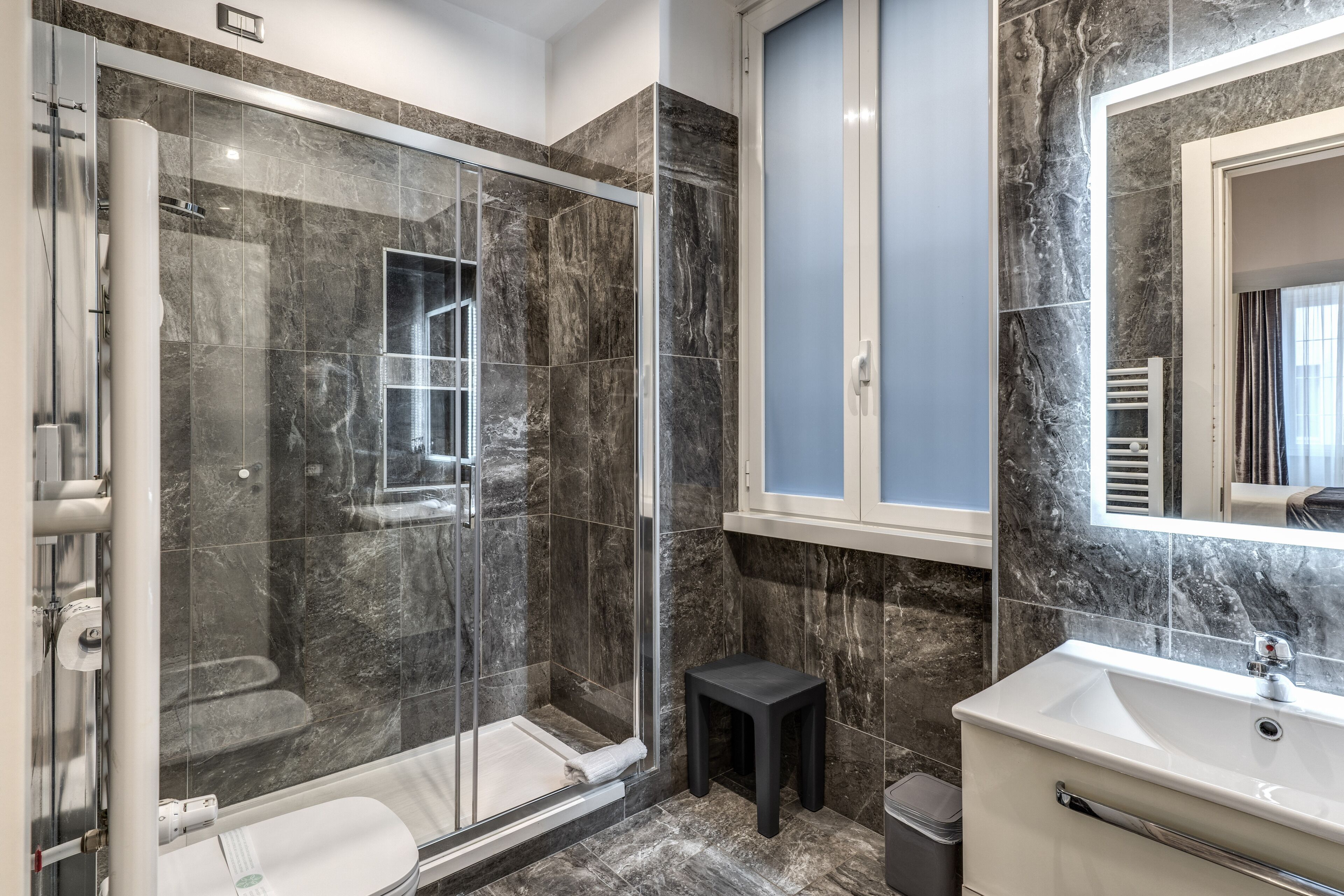 superior double room | bathroom | shower, hydromassage showerhead, free toiletries, hair dryer