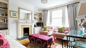 Apartment (2 Bedrooms) | Living area | TV, fireplace