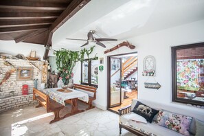 Villa (Sevid) | Living area | 28-inch flat-screen TV with satellite channels, TV, books - Sevid Holiday Homes (Marina)