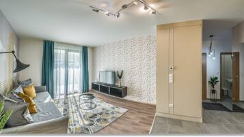 100-cm flat-screen TV with cable channels, TV