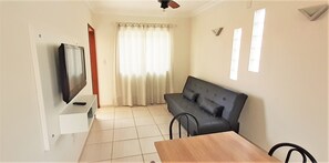 Living room - Residencial Miragem Bombinhas Uno (Bombinhas)